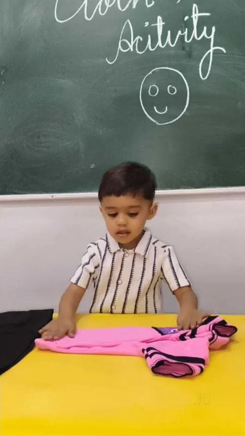 Cloth folding life-skill activity